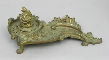 Appraisal: A French Inspired Inkwell Rococo style gilt inkwell with pen