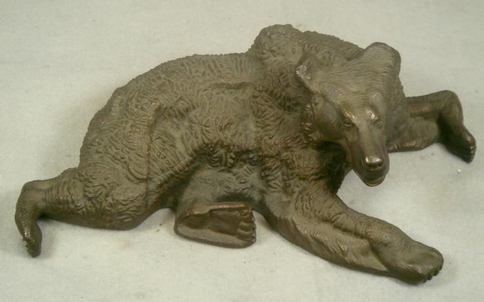 Appraisal: Cast iron doorstop brown grizzly bear tall x w Estimate