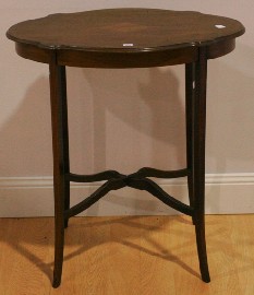 Appraisal: An Edwardian mahogany and inlaid occasional table cm wide cm