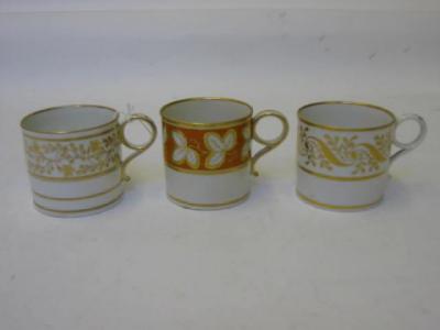 Appraisal: THREE WORCESTER PORCELAIN COFFEE CANS c one gilded with a