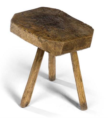 Appraisal: A large George IV elm and oak primitive stool circa