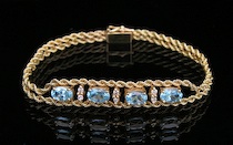 Appraisal: A Ladies' Gold Aquamarine and Diamond Bracelet k yellow gold