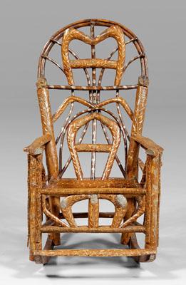 Appraisal: Folk art child's rocking chair rustic with chip-carved and bentwood