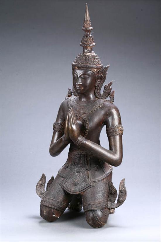 Appraisal: KNEELING BODHISATVA Asian th century bronze Kneeling figure with a