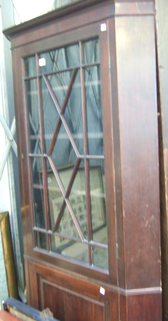 Appraisal: A th oak corner display cabinet the top section with