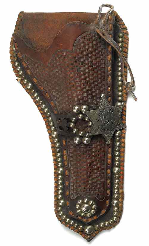 Appraisal: Leather tooled holster with a silver star inscribed Deputy Kern