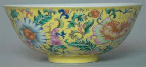 Appraisal: CHINESE FAMILLE ROSE YELLOW-GROUND BOWL Daoguang six-character seal mark in