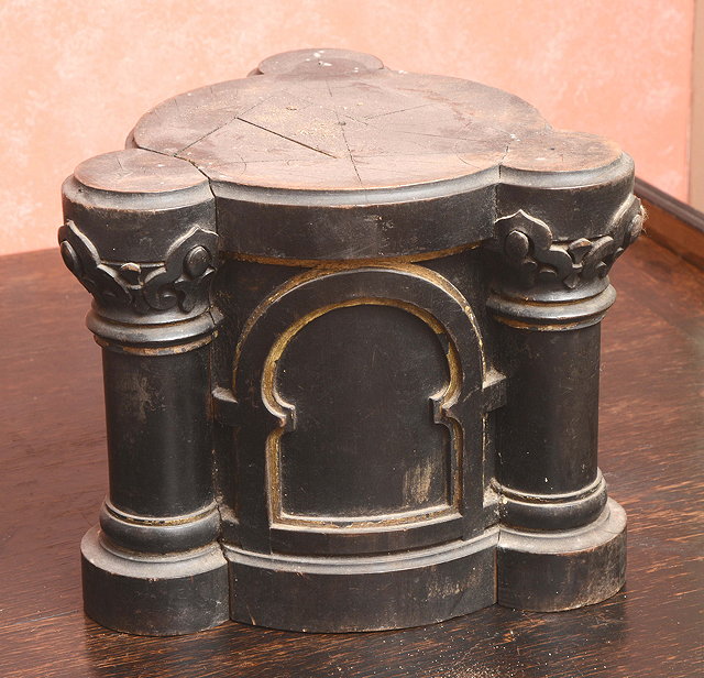 Appraisal: A CARVED TRIFORM EBONISED STAND in the Gothic revival taste