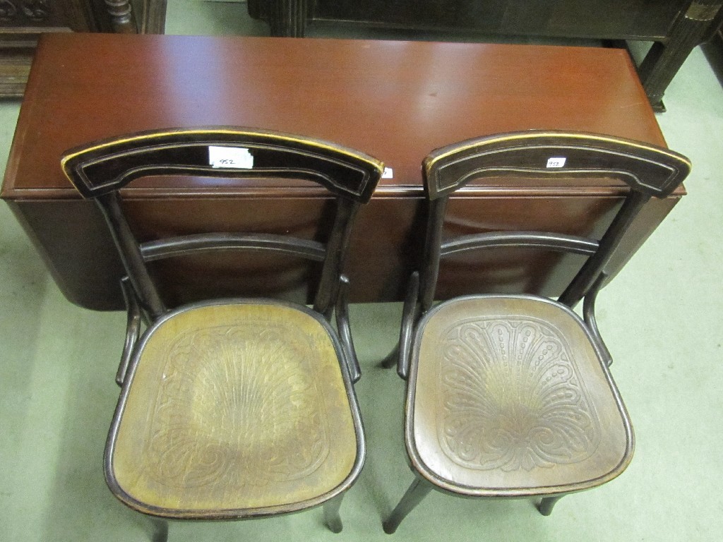 Appraisal: Edwardian mahogany drop leaf dining table and two Thonet Bentwood