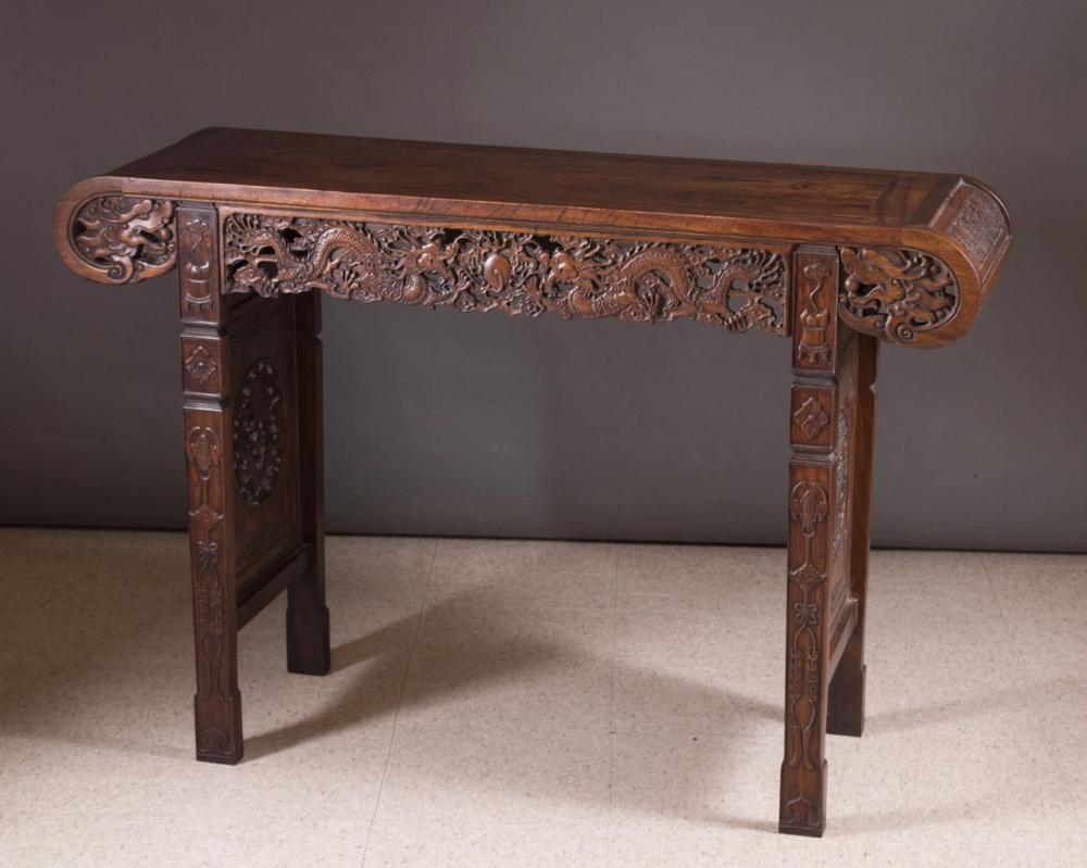 Appraisal: CHINESE MING-STYLE CARVED HONGMU ALTAR TABLE the rectangular top featuring