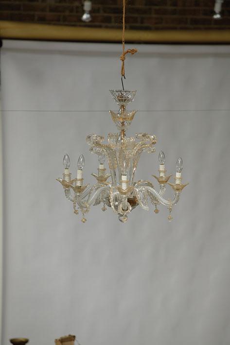 Appraisal: A PAIR OF VENETIAN CLEAR AND GILT GLASS SIX BRANCH