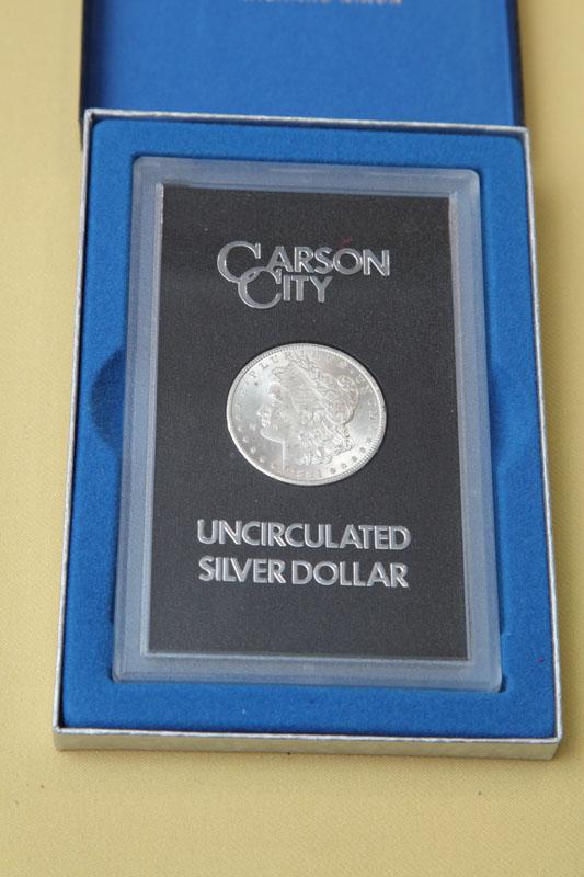 Appraisal: CARSON CITY SILVER DOLLAR In a lucite case and dated