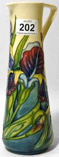 Appraisal: Moorcroft Jug decorated with flowers in a limited edition for