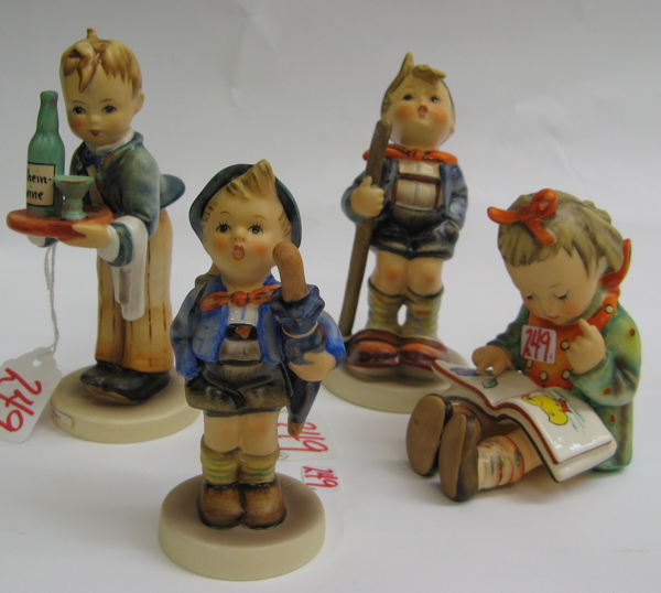 Appraisal: FOUR GERMAN HUMMEL FIGURES Waiter HUM H TM- Little Hiker