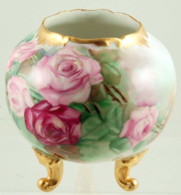 Appraisal: A Limoges handpainted porcelain rose bowl Handpainted with roses with