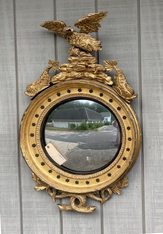 Appraisal: Fine Regency Period Carved Gilded Convex Mirror with eagle dolphin