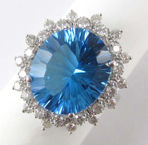 Appraisal: BLUE TOPAZ DIAMOND AND FOURTEEN KARAT WHITE GOLD RING with