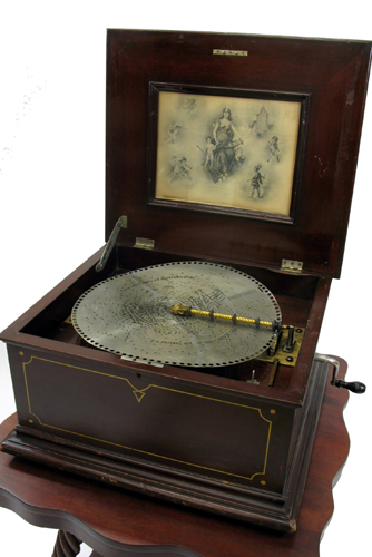 Appraisal: REGINA TABLE MODEL SINGLE COMB DISC MUSIC BOX Regina Music