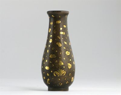 Appraisal: A good Chinese miniature bronze gold splash vase with an