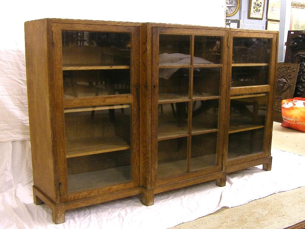 Appraisal: Heal Sons of London limed oak breakfront bookcase with three