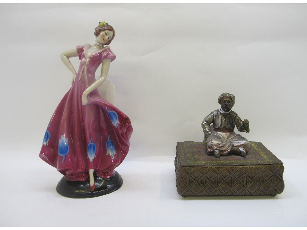 Appraisal: Continental Art Deco figure and a cigarette box surmounted by