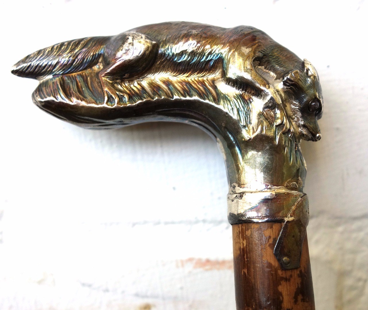 Appraisal: A silver walking stick handle hallmarked London cast as a