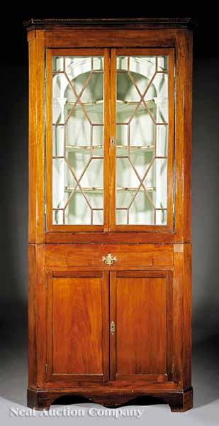 Appraisal: A George III Mahogany Corner Cupboard late th c in