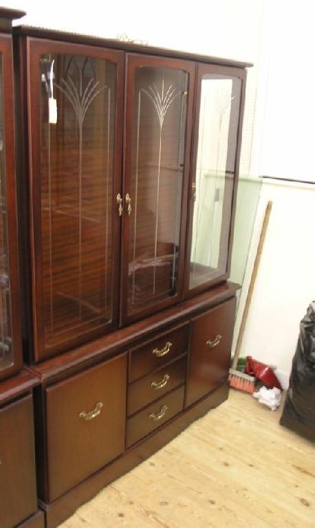 Appraisal: A modern mahogany wall unit two glass shelves enclosed by