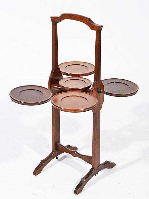 Appraisal: AN EARLY TH CENTURY TEAK FOLDING CAKE STAND 'The Monoplane'