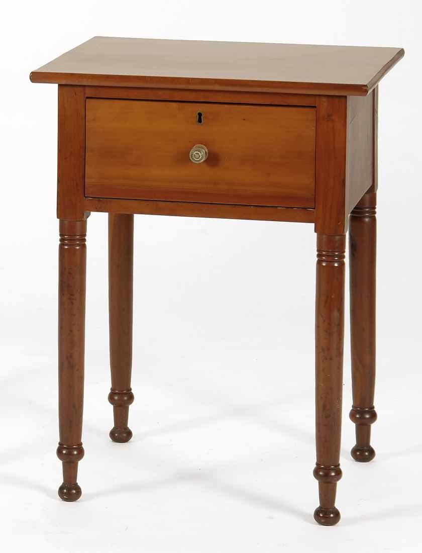 Appraisal: ANTIQUE AMERICAN ONE-DRAWER STAND Circa In cherry with simple turned