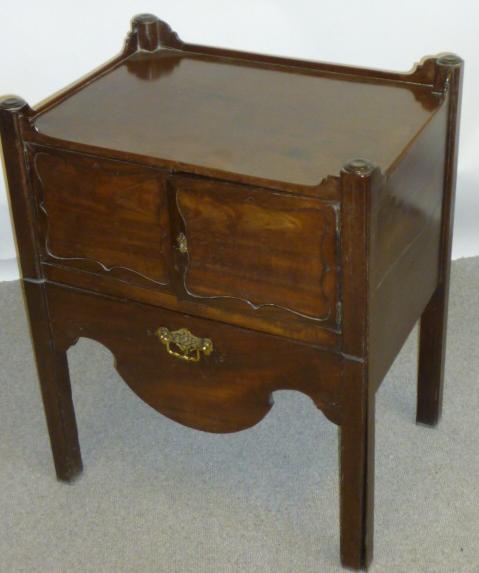 Appraisal: A GEORGE III MAHOGANY BEDSIDE CABINET the tray top with