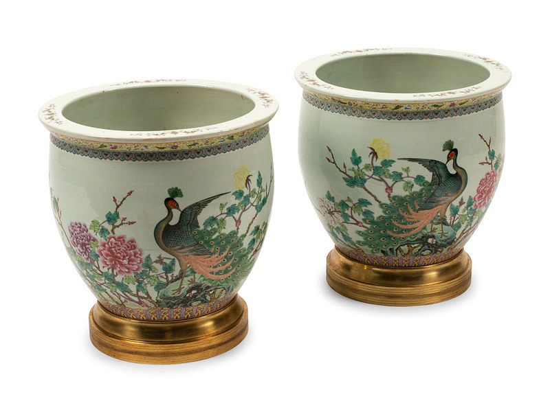 Appraisal: A Pair of Chinese Porcelain Jardinieres with Gilt Bronze Bases