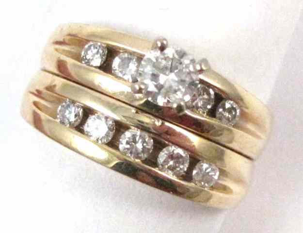 Appraisal: DIAMOND AND FOURTEEN KARAT GOLD RING the ring appears as