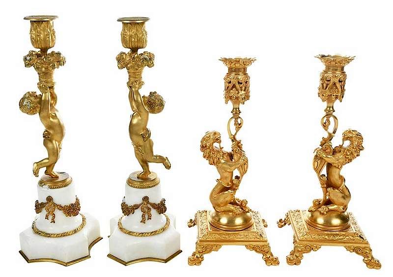 Appraisal: Two Pairs of Gilt Bronze Figural Candlesticks Continental late th