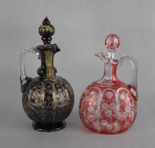 Appraisal: Two overlay glass decanters h and h