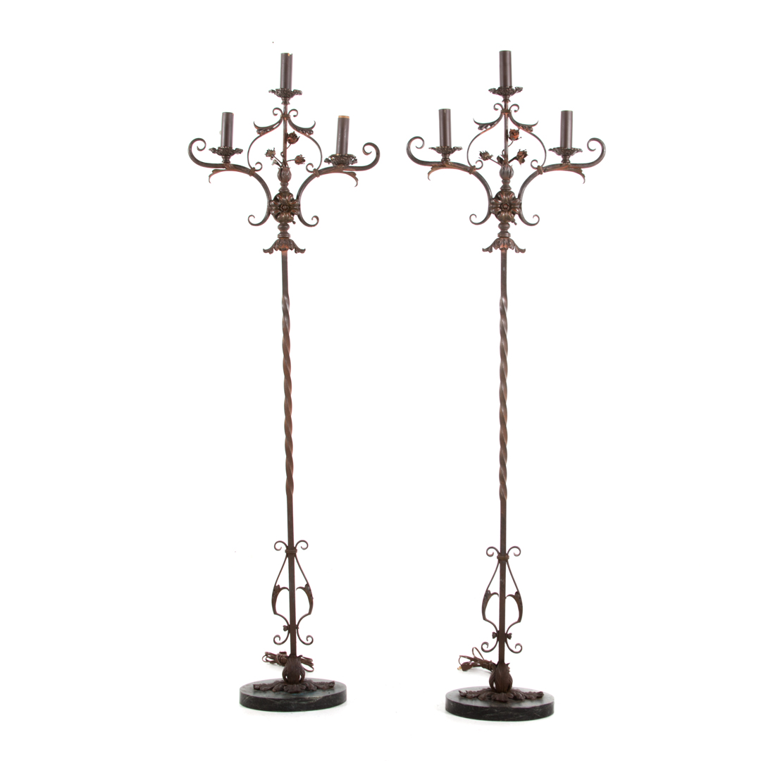 Appraisal: Pair Spanish wrought iron floor lamps early th century three