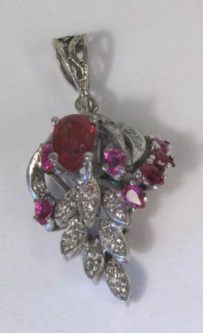 Appraisal: RUBY DIAMOND AND WHITE GOLD PENDANT The k white gold