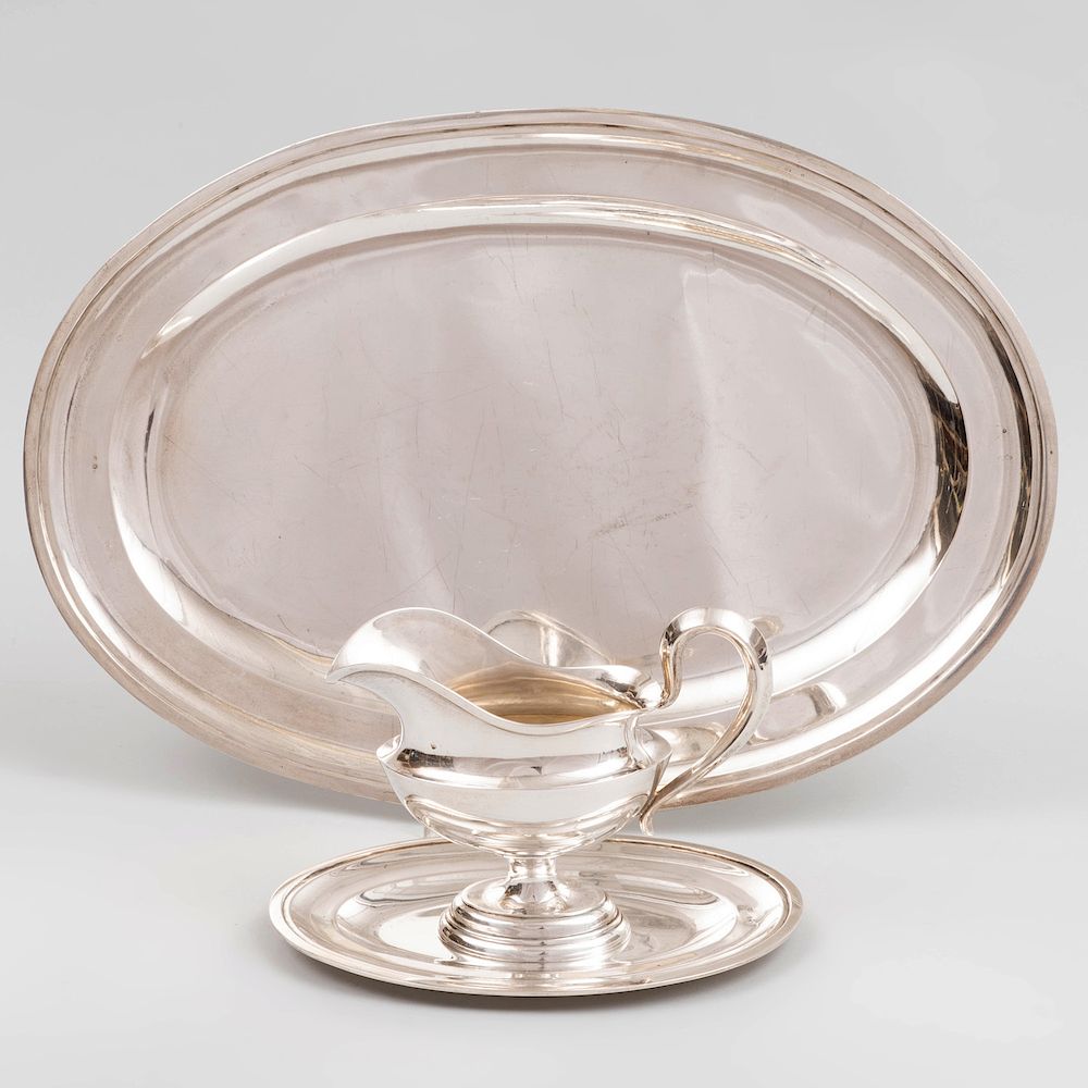 Appraisal: Hungarian Silver Sauce Boat on Stand and a Meat Platter