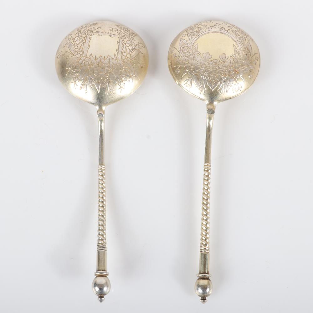 Appraisal: PAIR OF RUSSIAN GILT SILVER SERVING SPOONS WITH TURNED HANDLE