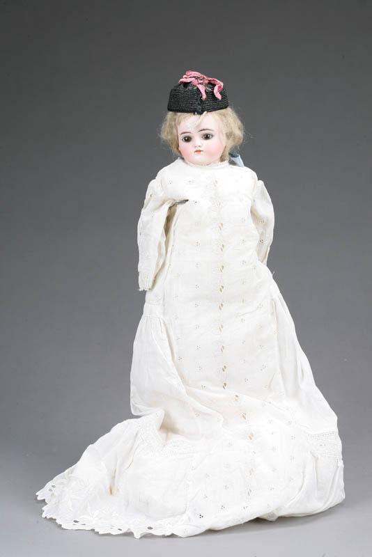 Appraisal: DOLL Bisque head and hands glass eyes and a cloth