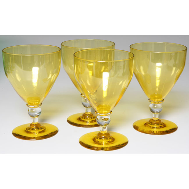 Appraisal: Steuben glasses set of four large shape in yellow glass