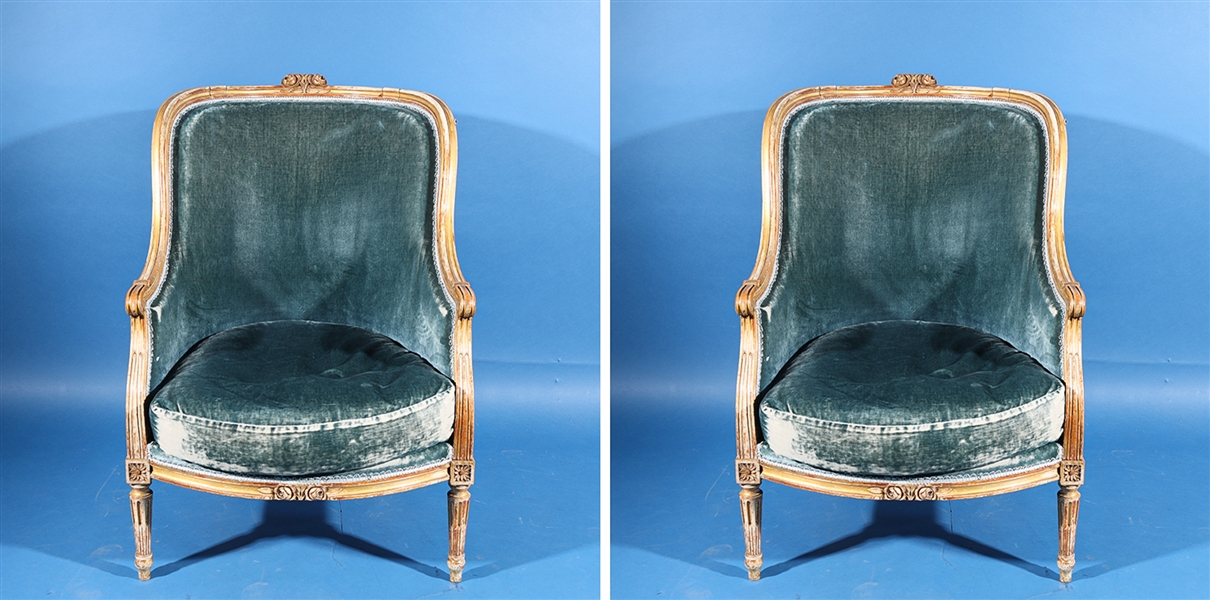 Appraisal: Pair of vintage wood and blue velvet chairs with carved