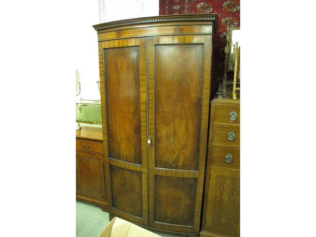 Appraisal: Mahogany bow fronted two door wardrobe