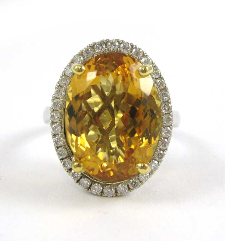 Appraisal: CITRINE DIAMOND AND FOURTEEN KARAT GOLD RING The white gold