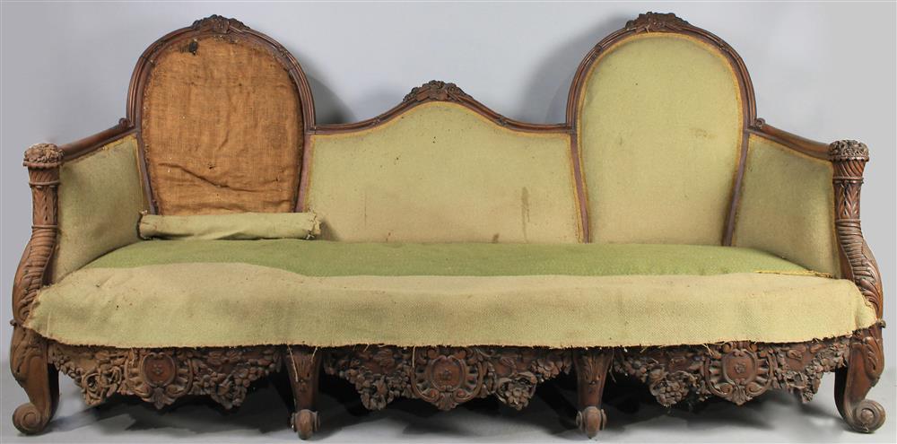 Appraisal: ROCOCO REVIVAL FLORAL AND MASONIC CARVED WALNUT SETTEE IN THE