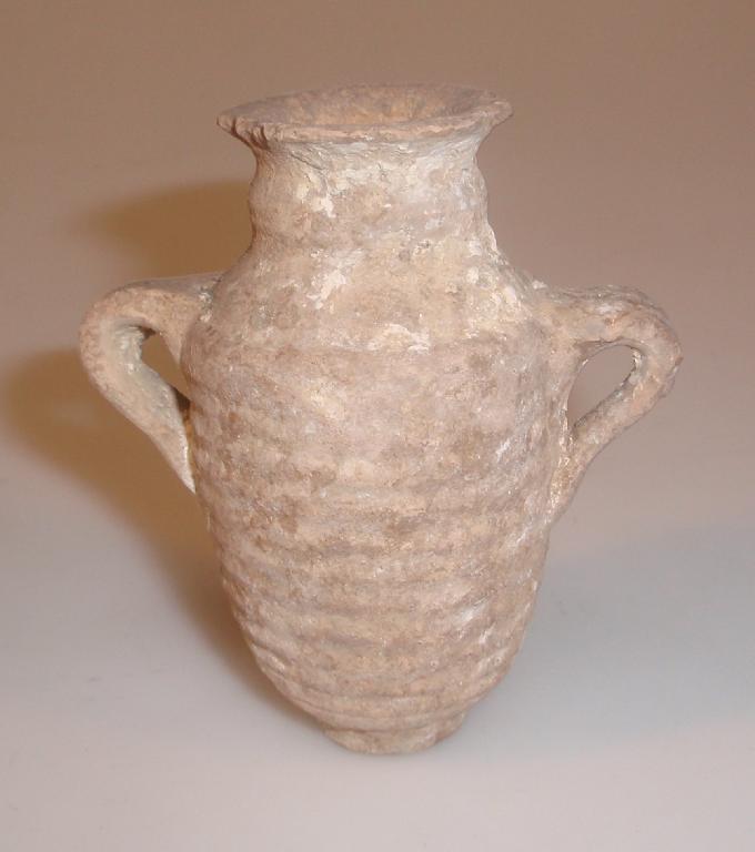 Appraisal: A miniature Roman two-handled pottery jar the chipped everted mouth