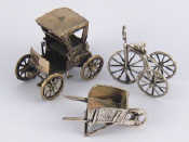 Appraisal: Italian silver miniatures A veteran car Italian assay a wheelbarrow