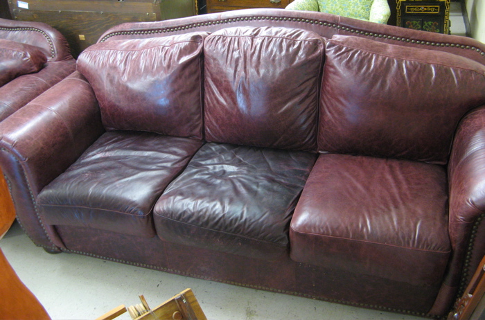 Appraisal: TRADITIONAL STYLE BURGUNDY LEATHER SOFA Robinson Robinson Inc San Diego