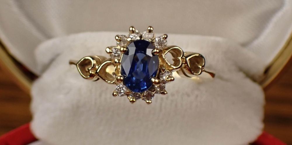 Appraisal: SAPPHIRE DIAMOND AND FOURTEEN KARAT GOLD RING The heart motif