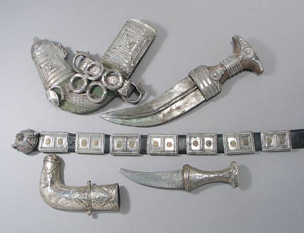 Appraisal: A silver-mounted Arabian jambiya with associated belt Late th or